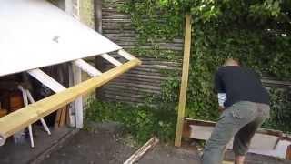 Garageport reparation af rådden bund